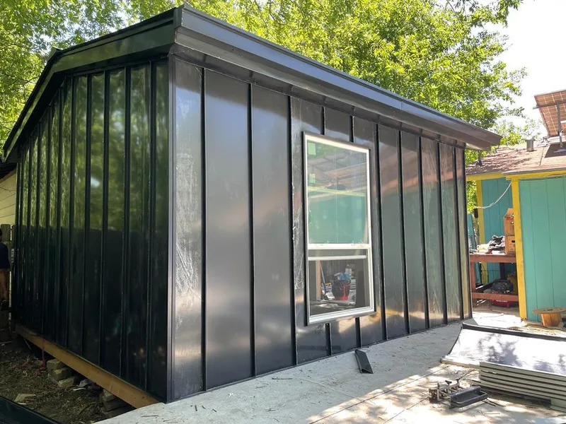 Black standing seam metal wall panels for Metal Roof Installation in Rowley